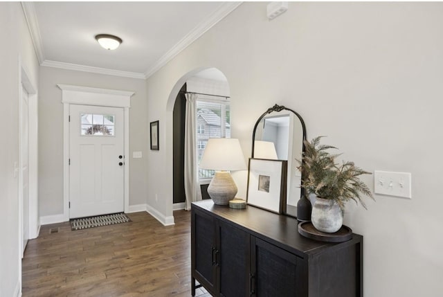 718 Excalibur Ct, Smyrna, TN 37167 - entryway with arched walkways, crown molding, and wood finished floors