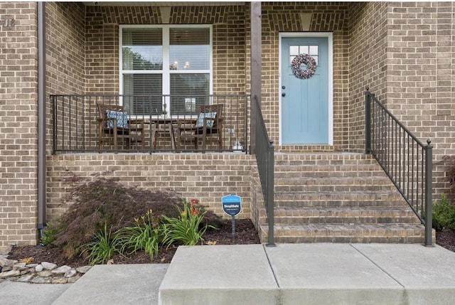 718 Excalibur Ct, Smyrna, TN 37167 - doorway to property with brick siding and a porch
