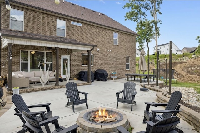 718 Excalibur Ct, Smyrna, TN 37167 - view of patio featuring an outdoor living space with a fire pit and area for grilling