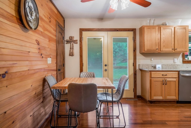 3121 Coon Hunter Lodge Rd, Jamestown, TN 38556 - dining space with dark wood finished floors, ceiling fan, wood walls, and french doors