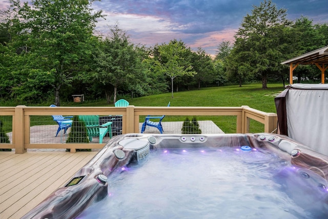 3121 Coon Hunter Lodge Rd, Jamestown, TN 38556 - deck featuring a hot tub, a yard, and view of scattered trees