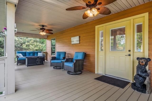 3121 Coon Hunter Lodge Rd, Jamestown, TN 38556 - deck with a ceiling fan and outdoor lounge area
