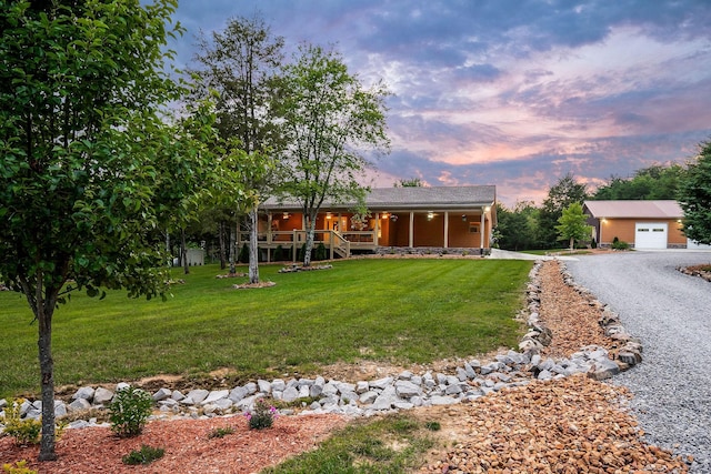 3121 Coon Hunter Lodge Rd, Jamestown, TN 38556 - view of front of house featuring covered porch, a yard, and driveway