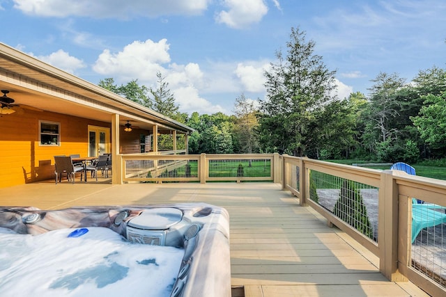 3121 Coon Hunter Lodge Rd, Jamestown, TN 38556 - wooden deck featuring a ceiling fan and outdoor dining space