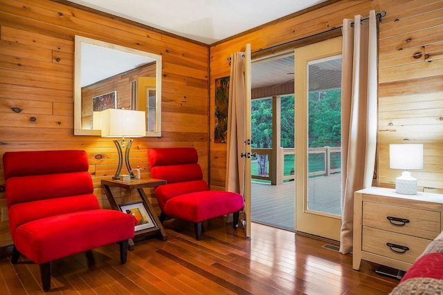 3121 Coon Hunter Lodge Rd, Jamestown, TN 38556 - sitting room featuring wood walls and hardwood / wood-style floors