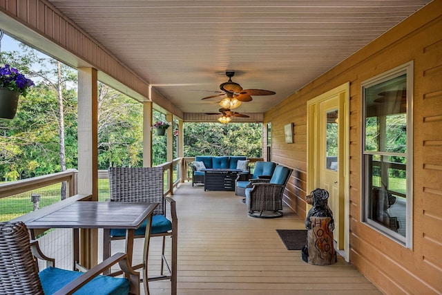 3121 Coon Hunter Lodge Rd, Jamestown, TN 38556 - wooden terrace featuring an outdoor living space and ceiling fan