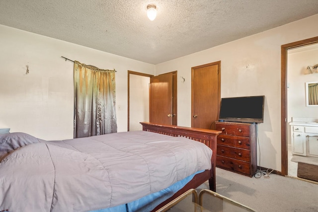 104 Chapman Dr, Lebanon, TN 37087 - carpeted bedroom with a textured ceiling and ensuite bathroom