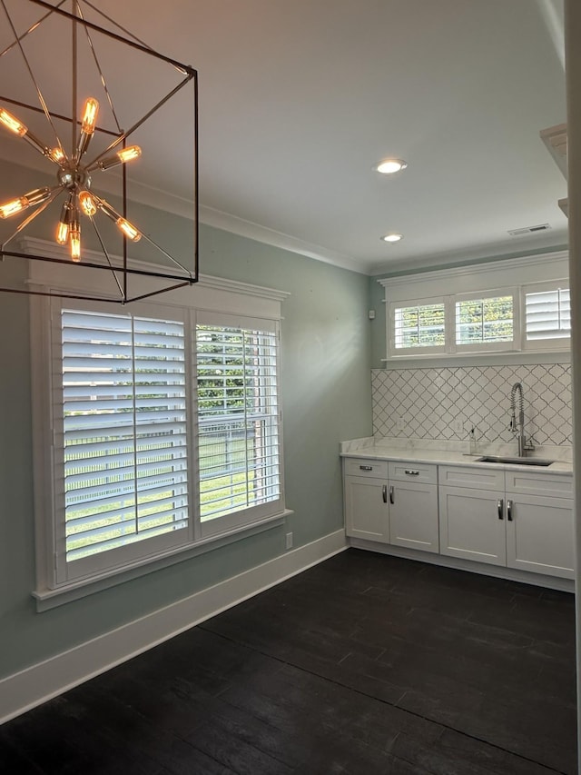 1430 Avellino Cir, Murfreesboro, TN 37130 - unfurnished dining area with ornamental molding, a chandelier, healthy amount of natural light, dark wood-type flooring, and recessed lighting
