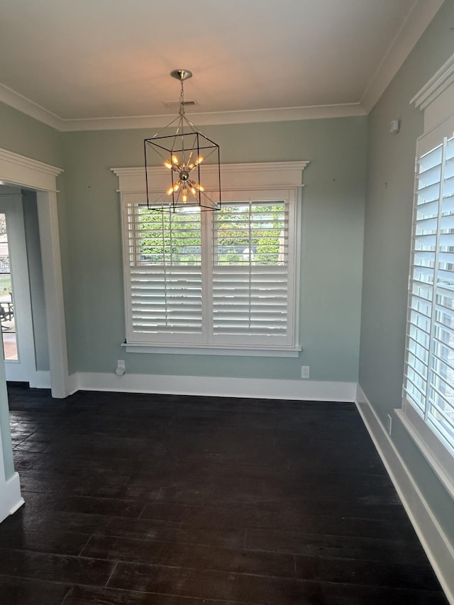 1430 Avellino Cir, Murfreesboro, TN 37130 - unfurnished dining area featuring healthy amount of natural light, a chandelier, dark wood-type flooring, and ornamental molding
