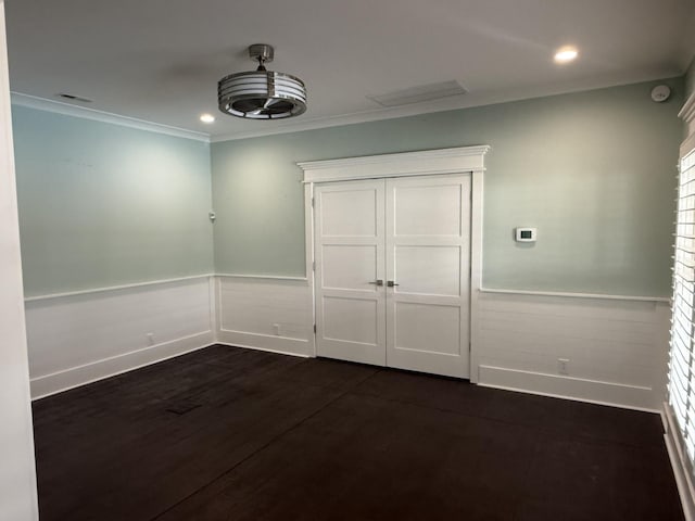 1430 Avellino Cir, Murfreesboro, TN 37130 - unfurnished bedroom featuring wainscoting, crown molding, recessed lighting, and dark wood-style flooring