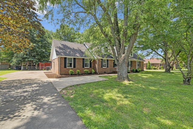 623 Haynes Dr, Murfreesboro, TN 37129 - view of front of house with brick siding, concrete driveway, and roof with shingles