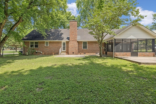 623 Haynes Dr, Murfreesboro, TN 37129 - rear view of property featuring entry steps, a sunroom, crawl space, a patio, and a lawn