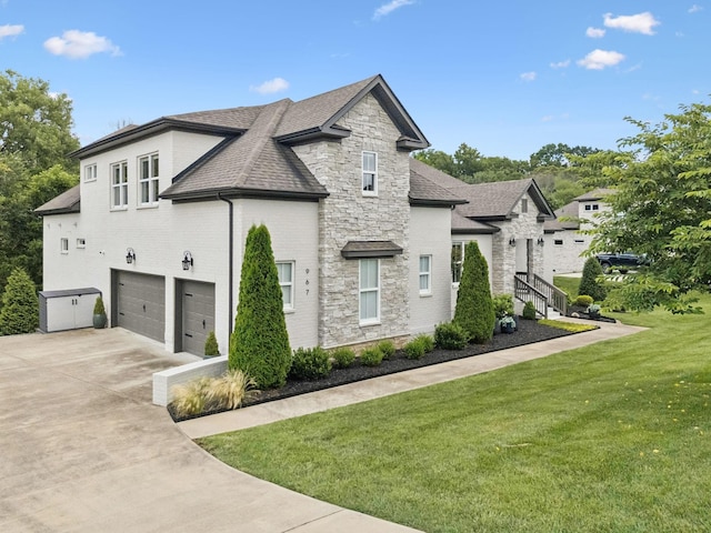 967 Nashs Nook, Columbia, TN 38401 - view of side of home featuring stone siding, an attached garage, a yard, driveway, and a shingled roof