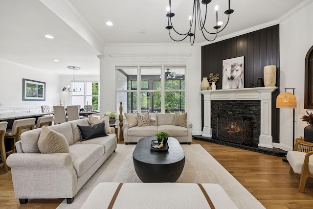 967 Nashs Nook, Columbia, TN 38401 - living area featuring a chandelier, ornamental molding, wood finished floors, a fireplace, and recessed lighting