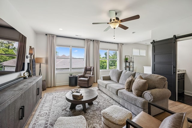 967 Nashs Nook, Columbia, TN 38401 - living area with a barn door, light wood-style flooring, ceiling fan, and recessed lighting