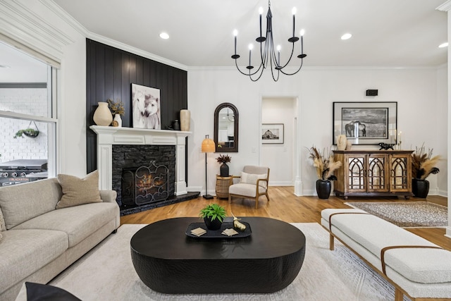 967 Nashs Nook, Columbia, TN 38401 - living room with crown molding, a fireplace, wood finished floors, a chandelier, and recessed lighting