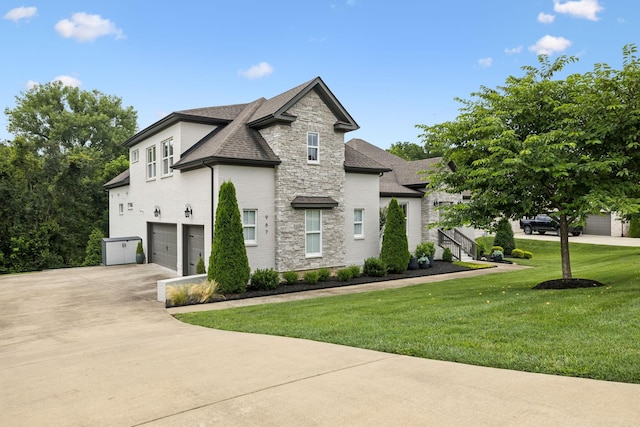 967 Nashs Nook, Columbia, TN 38401 - french provincial home featuring stone siding, a garage, driveway, a shingled roof, and a front lawn
