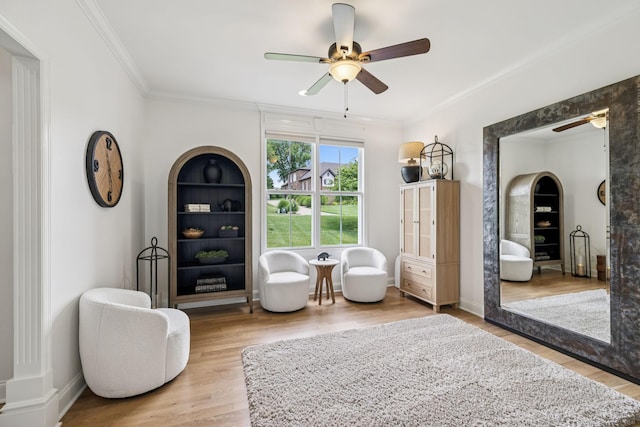 967 Nashs Nook, Columbia, TN 38401 - living area with ceiling fan, wood finished floors, and crown molding