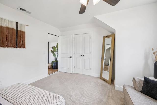 967 Nashs Nook, Columbia, TN 38401 - carpeted bedroom featuring ceiling fan and multiple closets