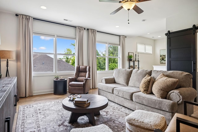 967 Nashs Nook, Columbia, TN 38401 - living room with a barn door, a ceiling fan, light wood-style flooring, and recessed lighting