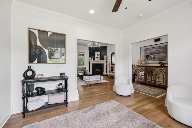 967 Nashs Nook, Columbia, TN 38401 - living room with ornamental molding, wood finished floors, ceiling fan, a chandelier, and recessed lighting