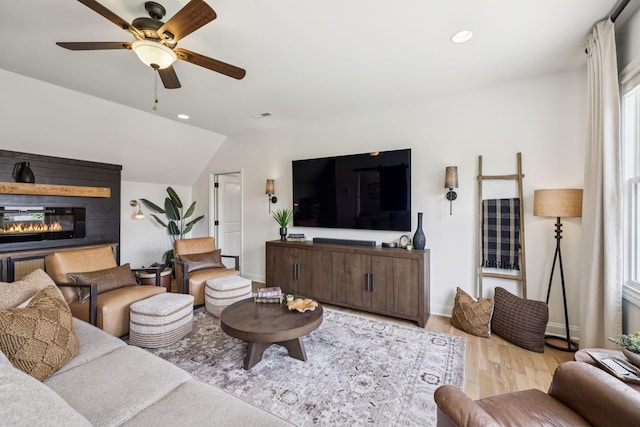 967 Nashs Nook, Columbia, TN 38401 - living area with wood finished floors, ceiling fan, lofted ceiling, recessed lighting, and a glass covered fireplace