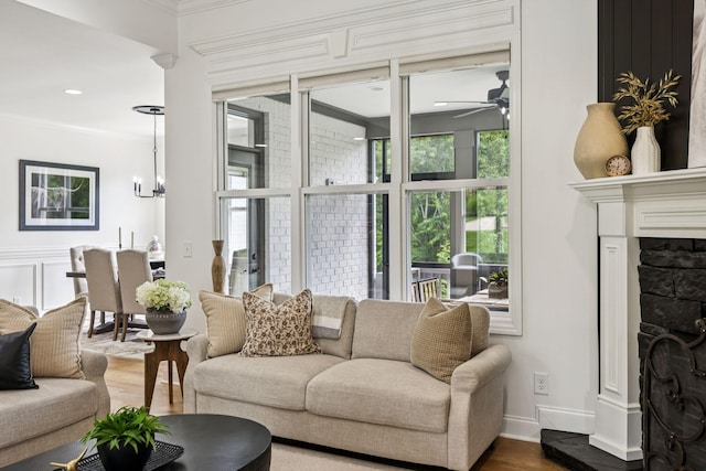 967 Nashs Nook, Columbia, TN 38401 - living area featuring a fireplace, a ceiling fan, crown molding, and wood finished floors