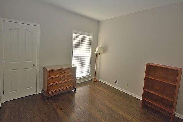 502 Johnstown Dr, Smyrna, TN 37167 - unfurnished bedroom with dark wood-style floors and baseboards
