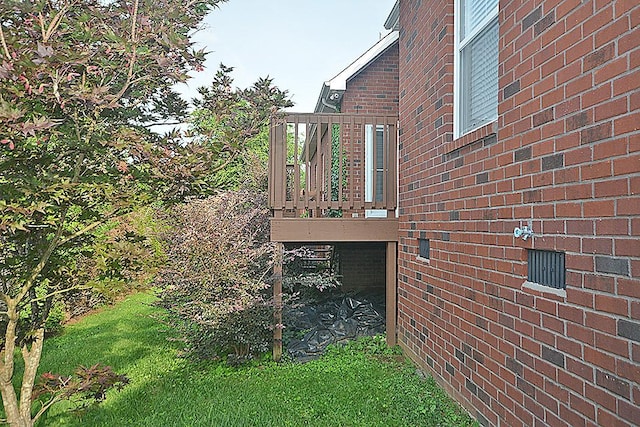 502 Johnstown Dr, Smyrna, TN 37167 - view of property exterior with brick siding, a deck, and a yard
