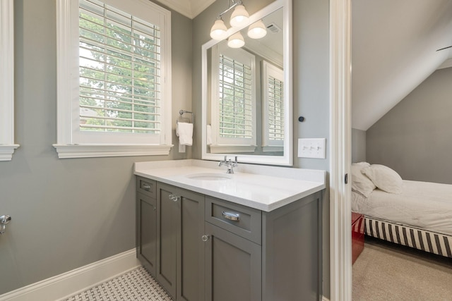 1014B Noelton Ave, Nashville, TN 37204 - ensuite bathroom featuring plenty of natural light, vanity, and lofted ceiling