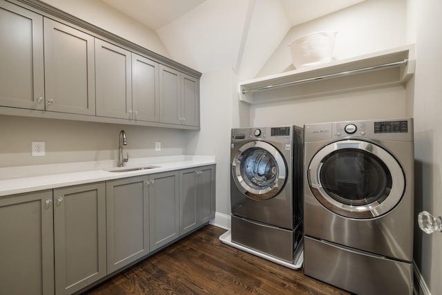 1014B Noelton Ave, Nashville, TN 37204 - washroom featuring cabinet space, washer and clothes dryer, and dark wood-style floors