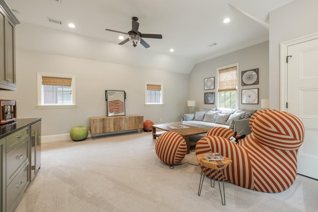1014B Noelton Ave, Nashville, TN 37204 - living room featuring light carpet, a ceiling fan, healthy amount of natural light, crown molding, and lofted ceiling