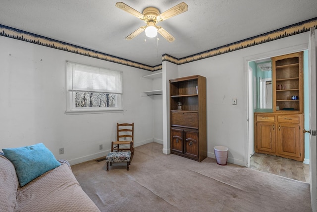2220 Potts Camp Rd, Smithville, TN 37166 - living area featuring ceiling fan, a textured ceiling, and light colored carpet