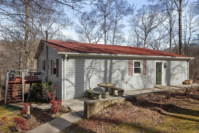 2220 Potts Camp Rd, Smithville, TN 37166 - view of property exterior featuring a deck and stairs