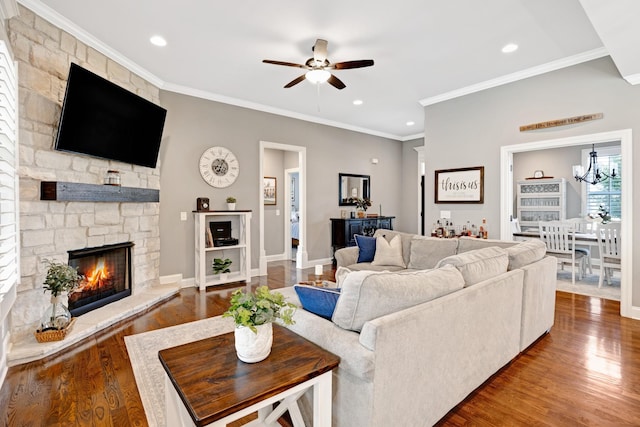 2003 Imagine Cir, Spring Hill, TN 37174 - living room with a ceiling fan, wood finished floors, recessed lighting, crown molding, and a stone fireplace