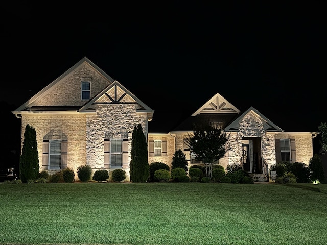 2003 Imagine Cir, Spring Hill, TN 37174 - view of front of property with stone siding and a yard