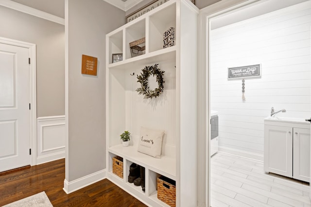 2003 Imagine Cir, Spring Hill, TN 37174 - mudroom featuring wood finished floors and ornamental molding