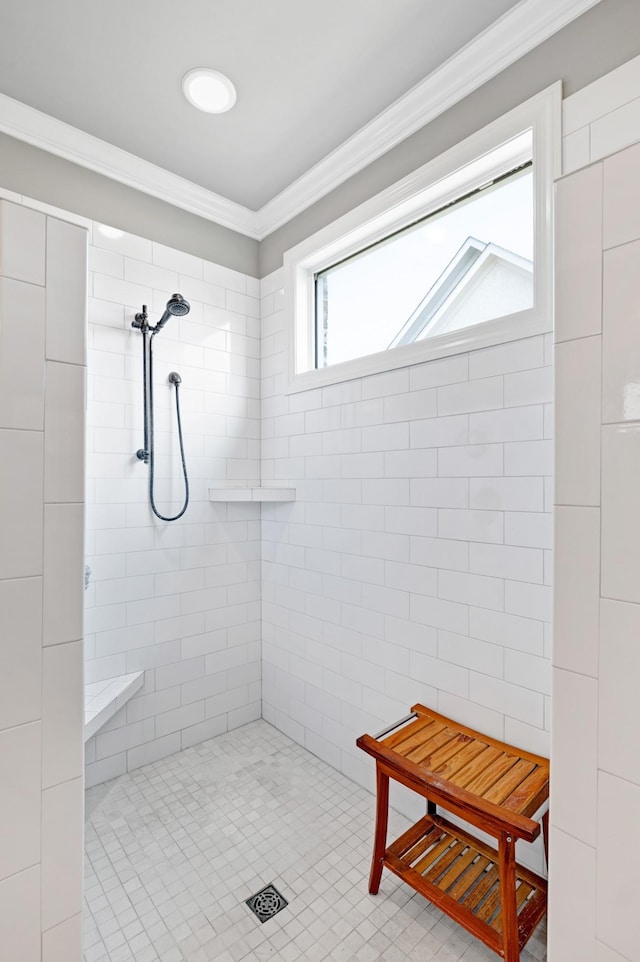 2003 Imagine Cir, Spring Hill, TN 37174 - bathroom featuring a tile shower, crown molding, and tile patterned flooring