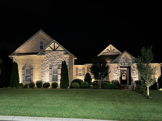 2003 Imagine Cir, Spring Hill, TN 37174 - view of front of property with stone siding and a lawn