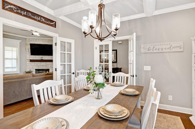 2003 Imagine Cir, Spring Hill, TN 37174 - dining area with french doors, wood finished floors, a chandelier, crown molding, and coffered ceiling