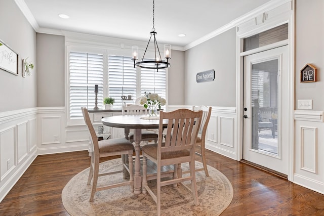 2003 Imagine Cir, Spring Hill, TN 37174 - dining space with a chandelier, dark wood-style flooring, a decorative wall, a wainscoted wall, and ornamental molding