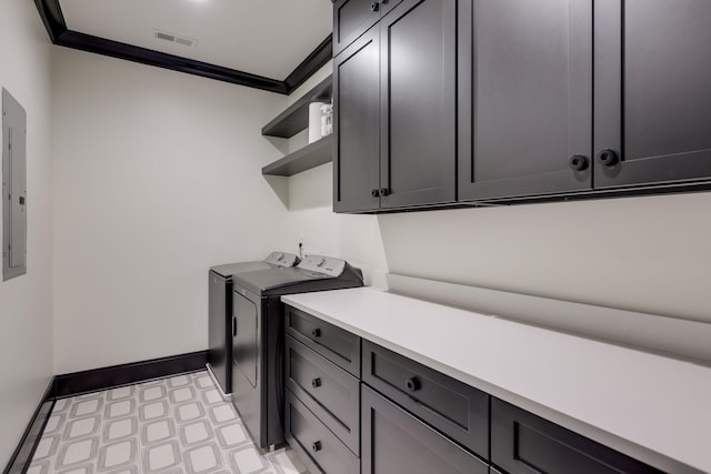 325 Fairpark Ct, Franklin, TN 37064 - washroom featuring washing machine and dryer, cabinet space, ornamental molding, and light floors