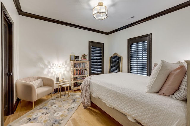 325 Fairpark Ct, Franklin, TN 37064 - bedroom featuring wood finished floors and crown molding