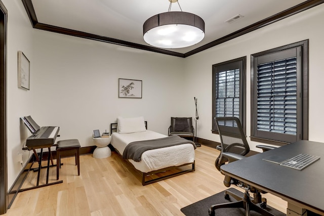325 Fairpark Ct, Franklin, TN 37064 - bedroom featuring ornamental molding, light wood-style flooring, and a desk