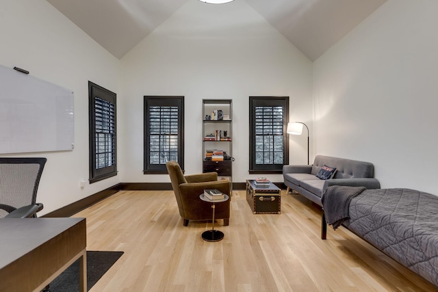 325 Fairpark Ct, Franklin, TN 37064 - living area featuring light wood-type flooring, healthy amount of natural light, and high vaulted ceiling