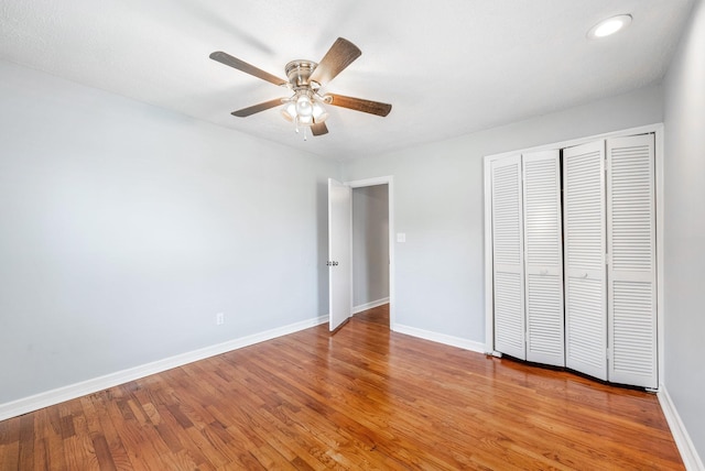 3509 Lafayette Rd, Hopkinsville, KY 42240 - unfurnished bedroom with light wood finished floors, a closet, recessed lighting, and ceiling fan