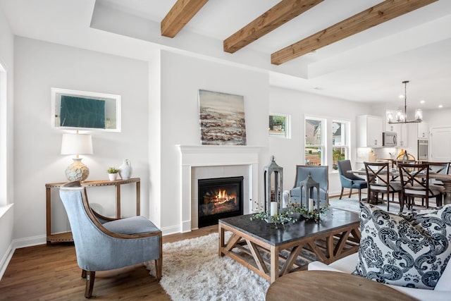 1808 Riverside Rd, Old Hickory, TN 37138 - living area featuring beam ceiling, wood finished floors, a tile fireplace, recessed lighting, and a chandelier