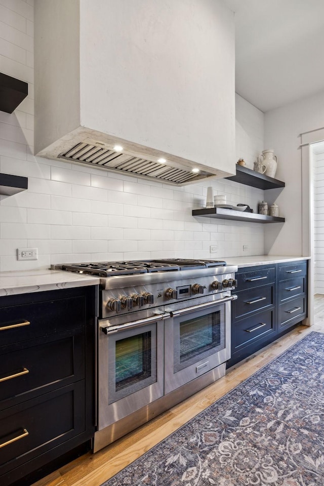 1514 Tyne Blvd, Nashville, TN 37215 - kitchen featuring double oven range, premium range hood, open shelves, decorative backsplash, and light stone countertops