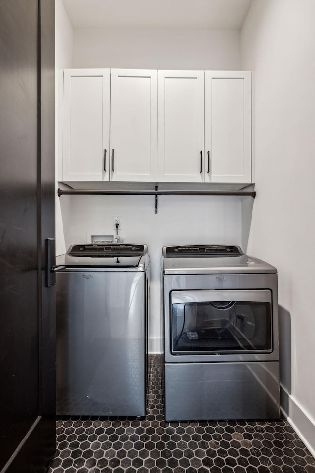 1514 Tyne Blvd, Nashville, TN 37215 - laundry area with cabinet space and washing machine and dryer