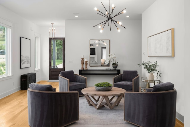 1514 Tyne Blvd, Nashville, TN 37215 - living room with a chandelier, healthy amount of natural light, and light wood-style flooring